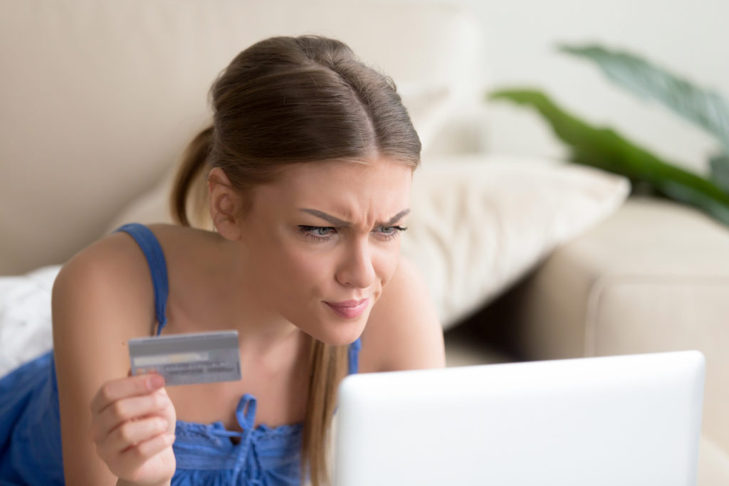 Woman paying bills online