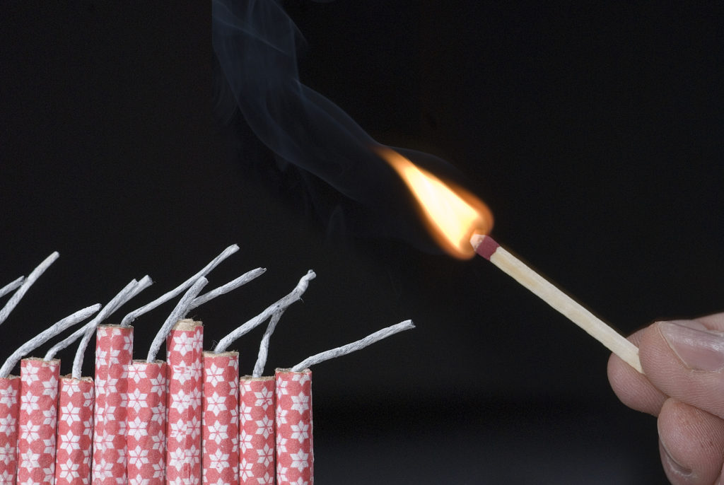 Lighting fireworks with match